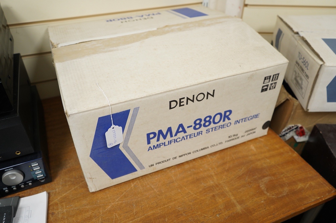 A pair of Monitor 14 loudspeakers, a Denon PMA-880R amplifier, a Denon TU-560L AM-FM tuner, a Bose subwoofer and a pair Bose Red Line cube swivel speakers, the. Denon and Monitor items are in their original card boxes.